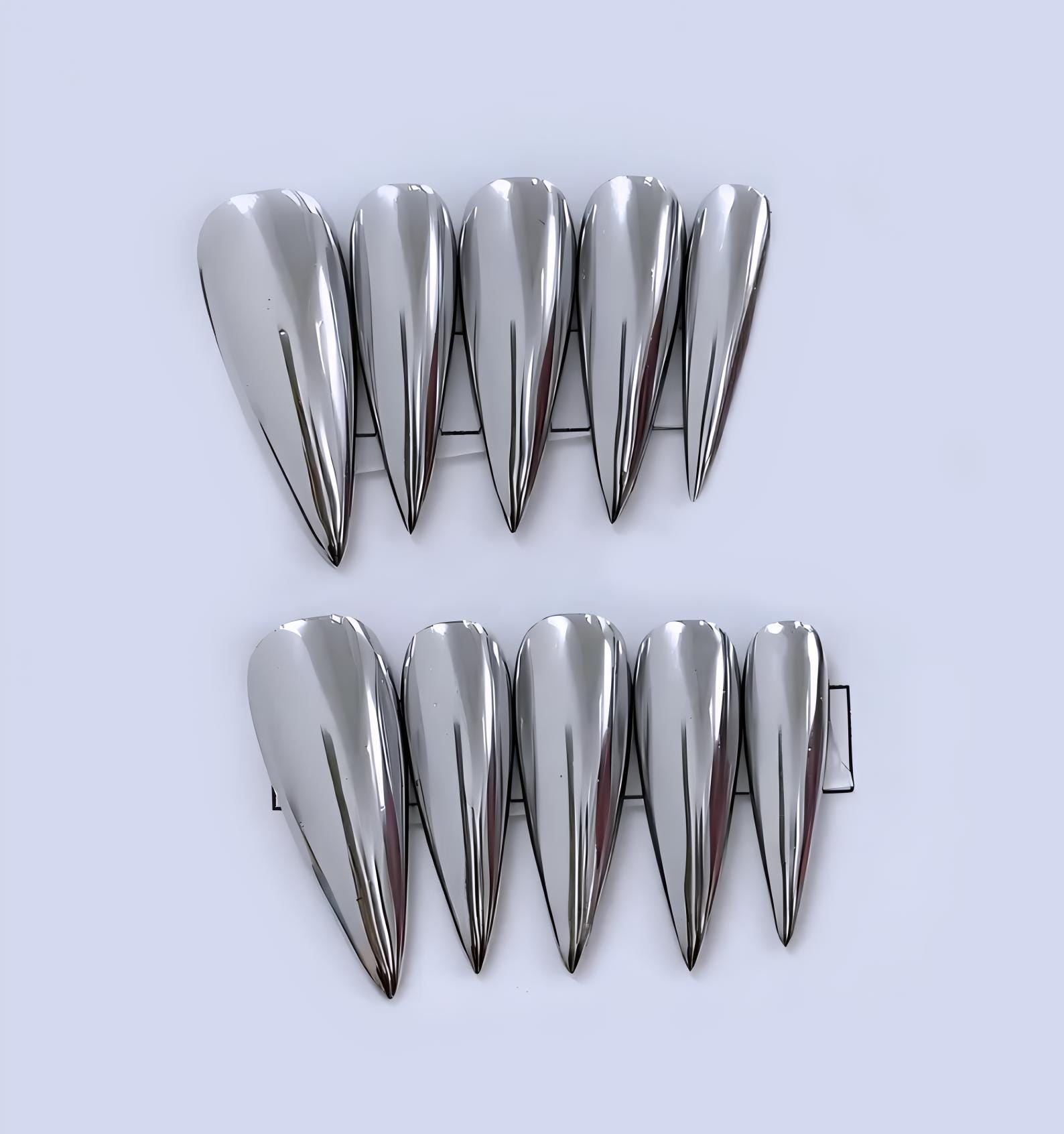 Edgy Chrome Silver Stiletto Press-On Nails - Long Pointed Metallic Fake Nails for a Bold Punk & Y2K Aesthetic - Fantastic nails